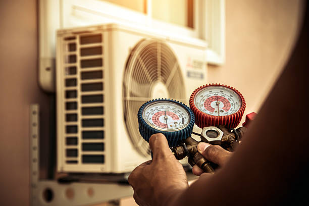 Professional Air Conditioning Service technician working in Minotola, NJ